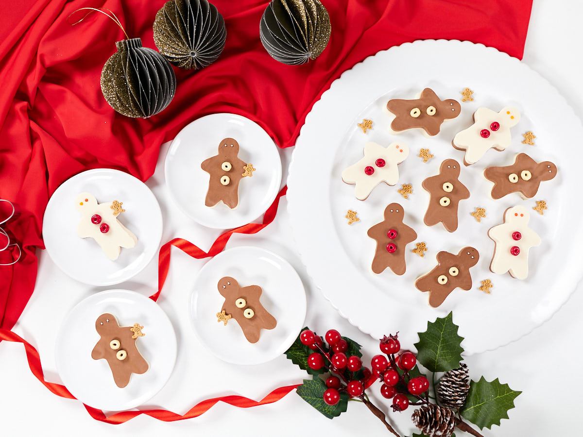 Gingerbread jello jigglers decorated with festive sprinkles.